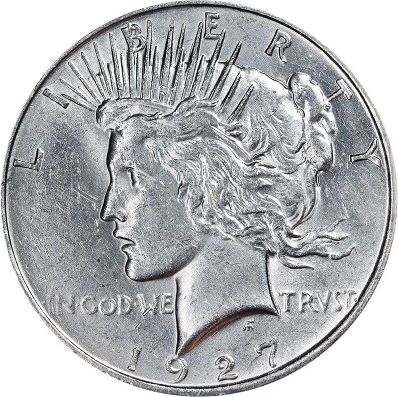 Uncirculated 1927-D Silver Peace Dollar with Lustrous Finish: Uncirculated 1927-D Silver Peace Dollar with Lustrous Finish This 1927-D Peace Dollar showcases outstanding eye appeal with its fantastic luster and quality strike. The coin exhibits bright white colo
