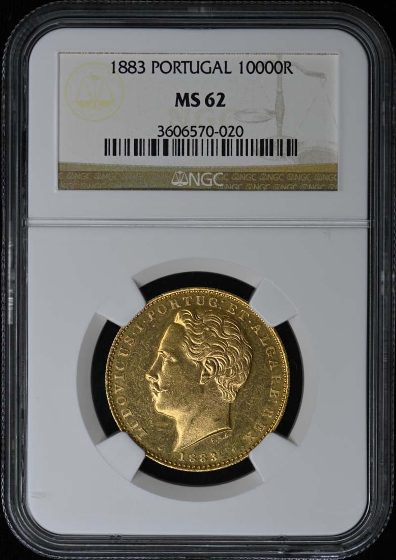 Portugal 1883 10000 Reis Gold Coin NGC MS62 Certified .5529oz Mintage 8500: Portugal 1883 10000 Reis Gold Coin NGC MS62 Certified .5529oz Mintage 8500 This 1883 Portugal 10000 Reis coin is certified by NGC with a grade of MS62, indicating it is in un-used condition. It has a 
