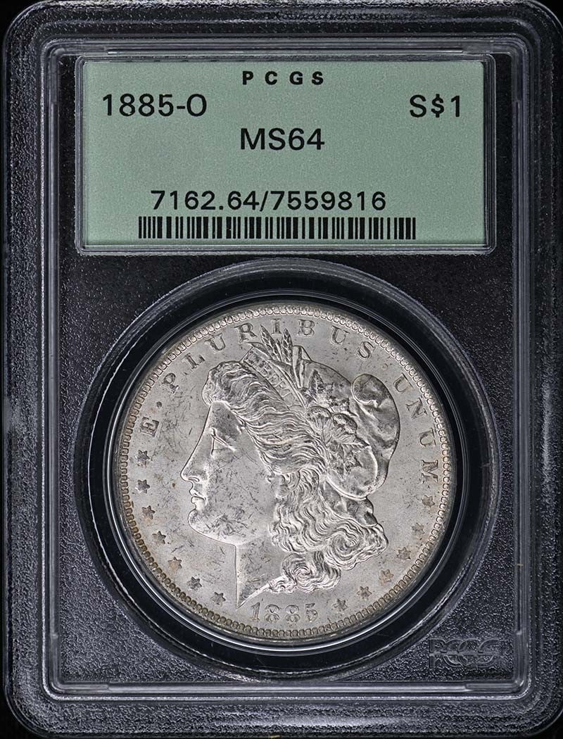 PCGS MS64 1885-O Morgan Silver Dollar New Orleans: PCGS MS64 1885-O Morgan Silver Dollar New Orleans This 1885 Morgan Dollar was struck at the New Orleans Mint and is graded MS64 by PCGS. The coin is uncirculated and comes in an old green holder (OGH)