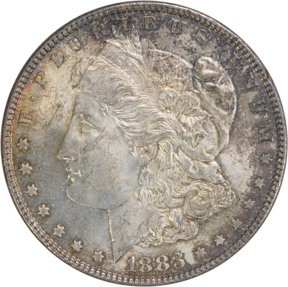 Uncirculated 1883 Morgan Dollar Silver Choice BU Toned Uncertified: Uncirculated 1883 Morgan Dollar Silver Choice BU Toned Uncertified This is an 1883 Morgan Silver Dollar featuring attractive toning. The coin is uncirculated and classified as Choice Brilliant Uncircu