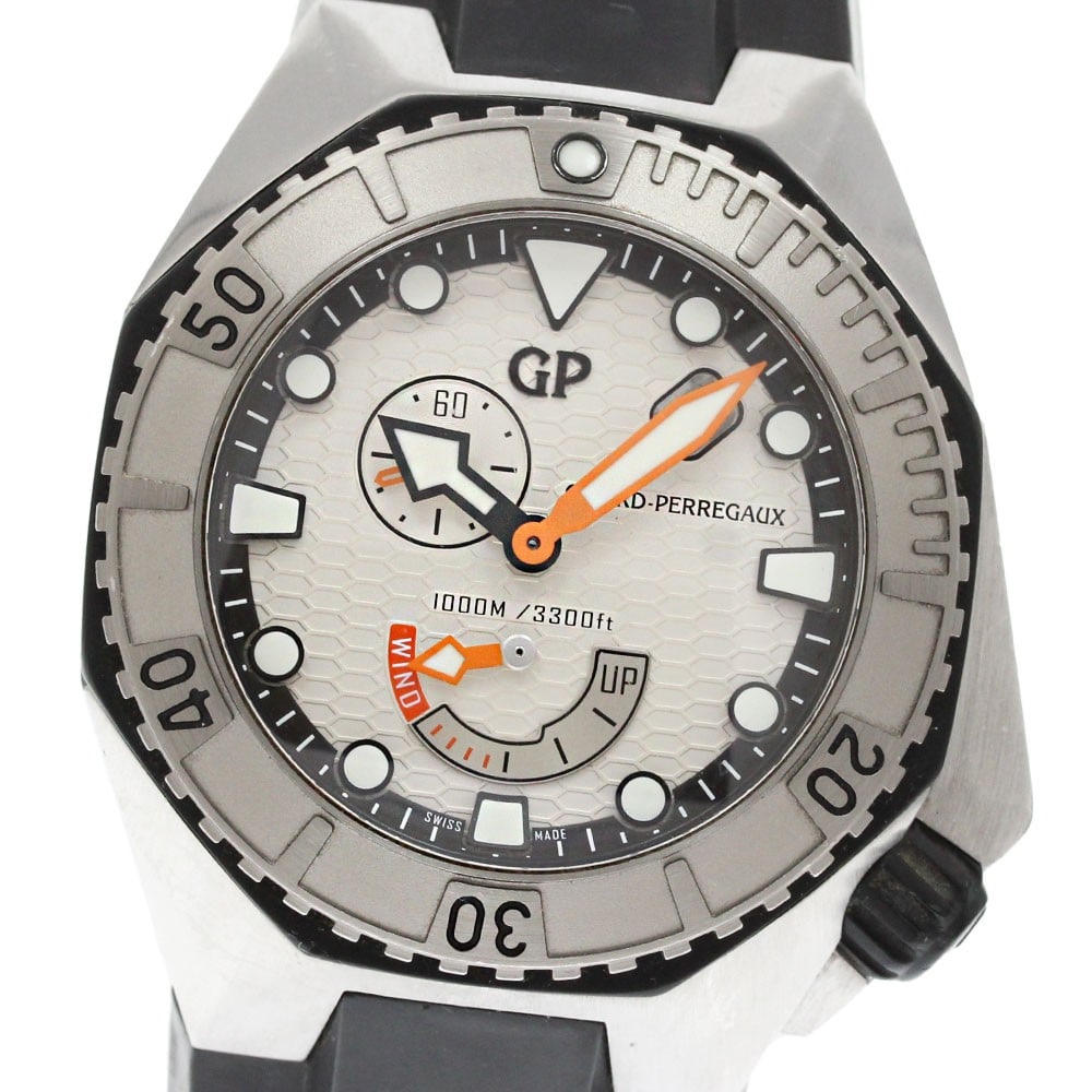 Seahawk Girard Perregaux Automatic Steel Men's Wristwatch 44mm: Seahawk Girard Perregaux Automatic Steel Men's Wristwatch 44mm This Girard Perregaux Seahawk men's wristwatch features a stainless steel case paired with a rubber band and a silver dial. The watch ope