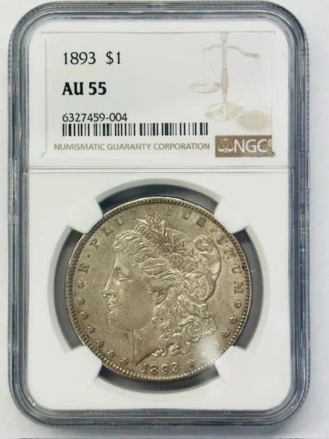 NGC AU 55 1893 Morgan Silver Dollar: NGC AU 55 1893 Morgan Silver Dollar This 1893 Morgan Silver Dollar has been graded AU-55 by NGC, indicating an About Uncirculated condition. The coin is composed of silver and originates from the USA.