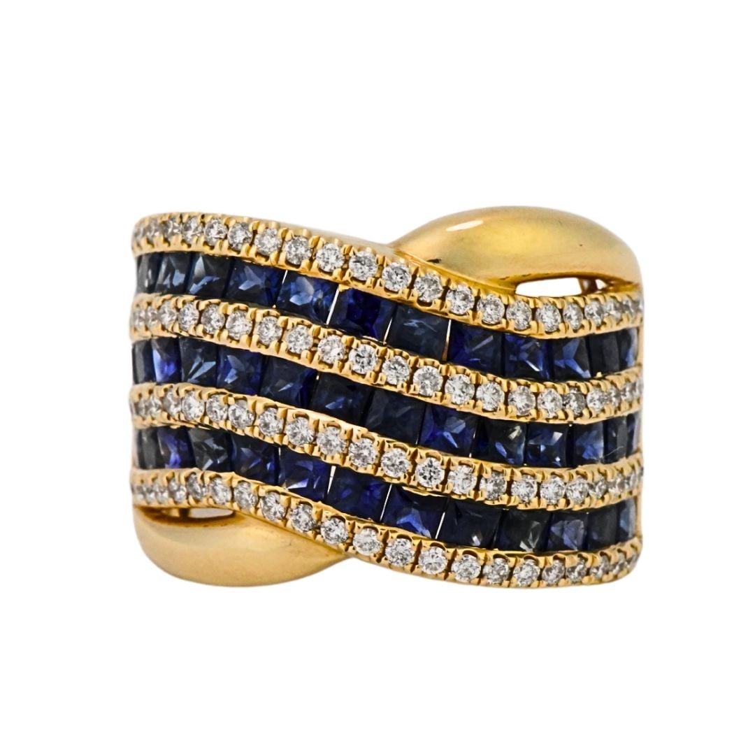14K Yellow Gold Sapphire Diamond Cocktail Ring Size 7: 14K Yellow Gold Sapphire Diamond Cocktail Ring Size 7 This elegant cocktail ring is crafted from 14k yellow gold and features a custom design with square cut natural blue sapphires totaling 2.00 carat