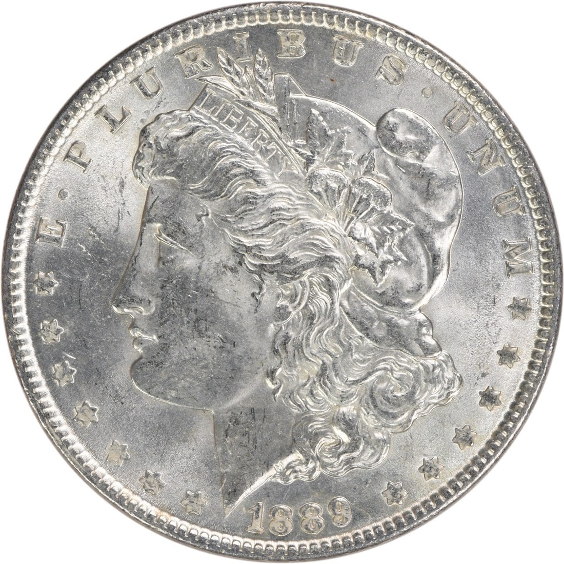 Choice BU 1889 Silver Morgan Dollar Uncertified No Mint Mark: Choice BU 1889 Silver Morgan Dollar Uncertified No Mint Mark This 1889 Morgan Silver Dollar is an uncirculated coin in Choice BU condition. It features the classic Morgan design and is composed of sil