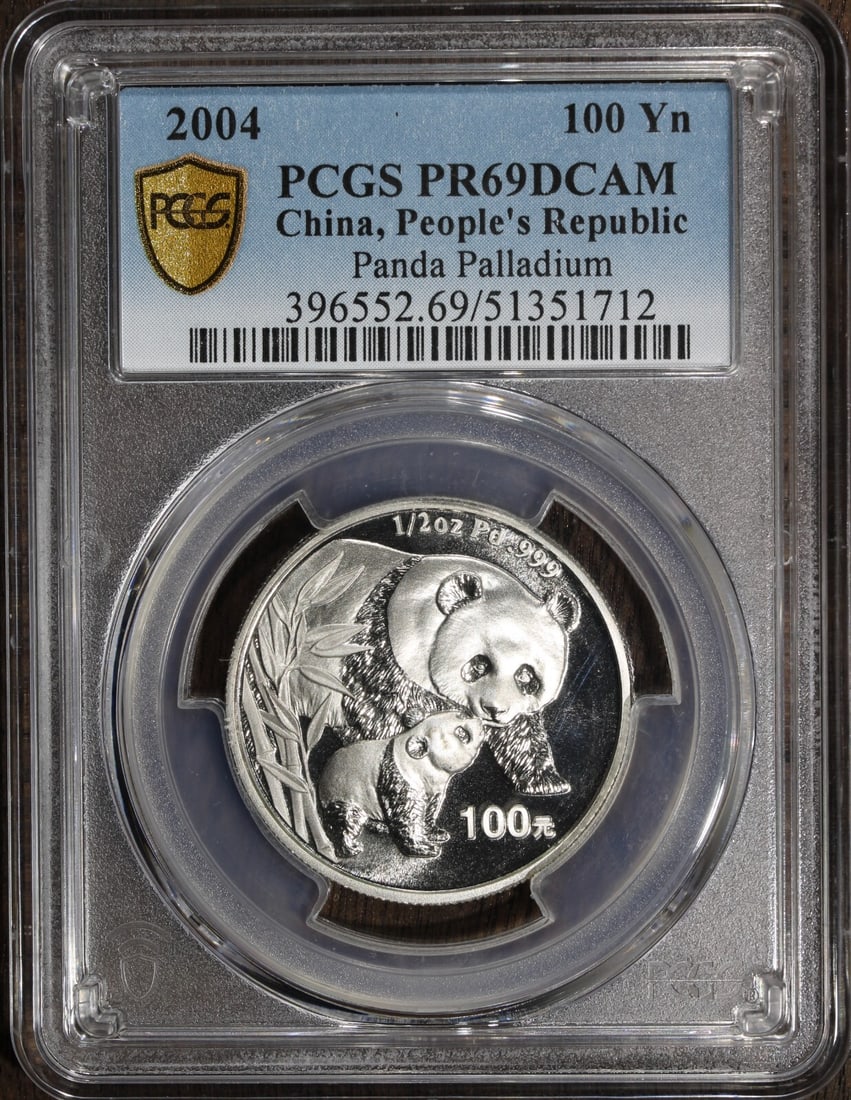 2004 Proof Chinese Panda 100 Yuan Palladium Coin PCGS 1/2 Oz OGP COA: 2004 Proof Chinese Panda 100 Yuan Palladium Coin PCGS 1/2 Oz OGP COA This stunning 2004 Chinese Panda coin is made of high-quality palladium, boasting a remarkable fineness of 0.999. It features a hal