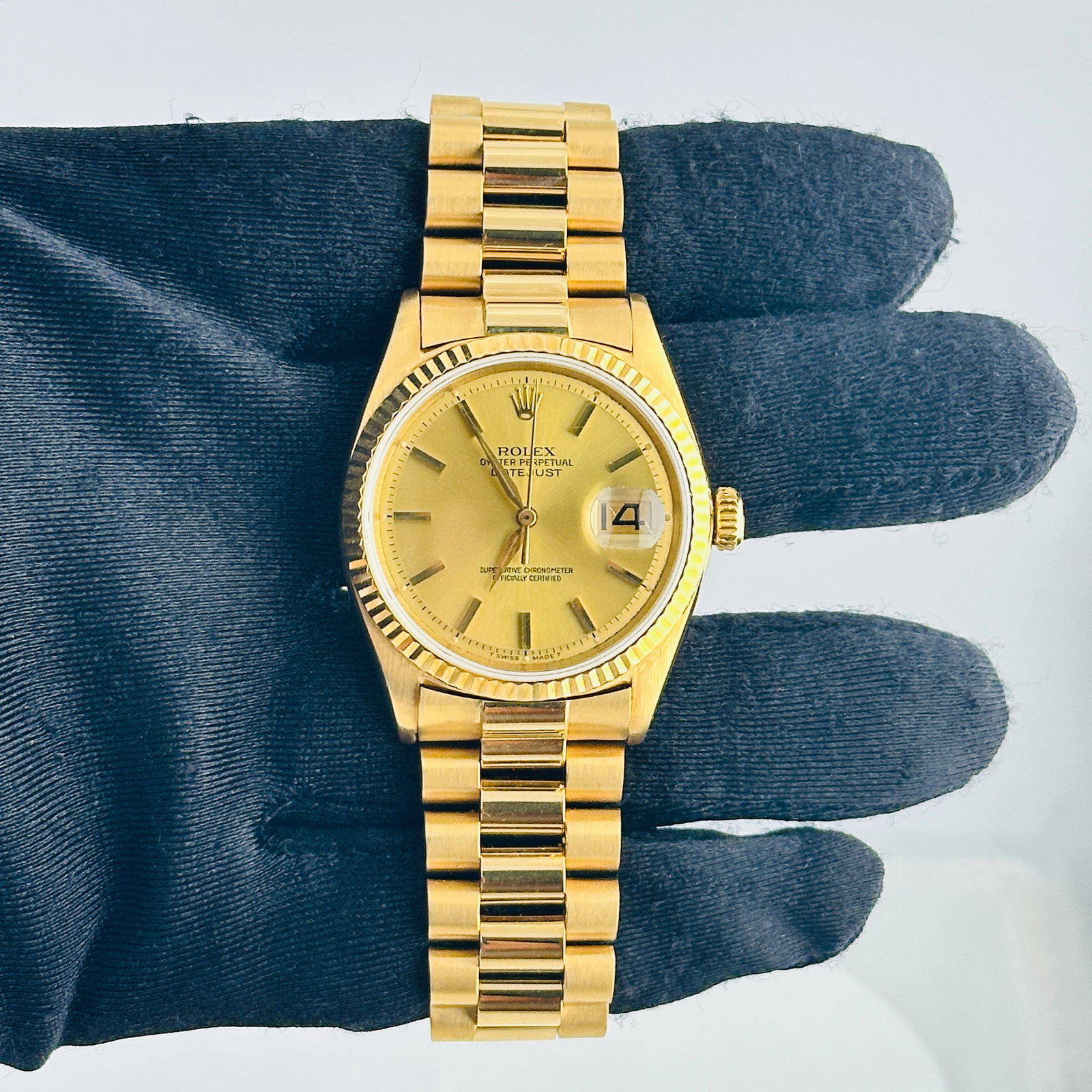 Rolex Datejust Ref 1602 Mens Watch Champagne Dial aftermarket 18K Presi Bracelet: Rolex Datejust Ref 1602 Mens Watch Champagne Dial aftermarket 18K Presi Bracelet Mens Rolex Datejust watch, reference 1602, with a champagne stick dial, fluted bezel, and Aftermarket Presi 18K bracele