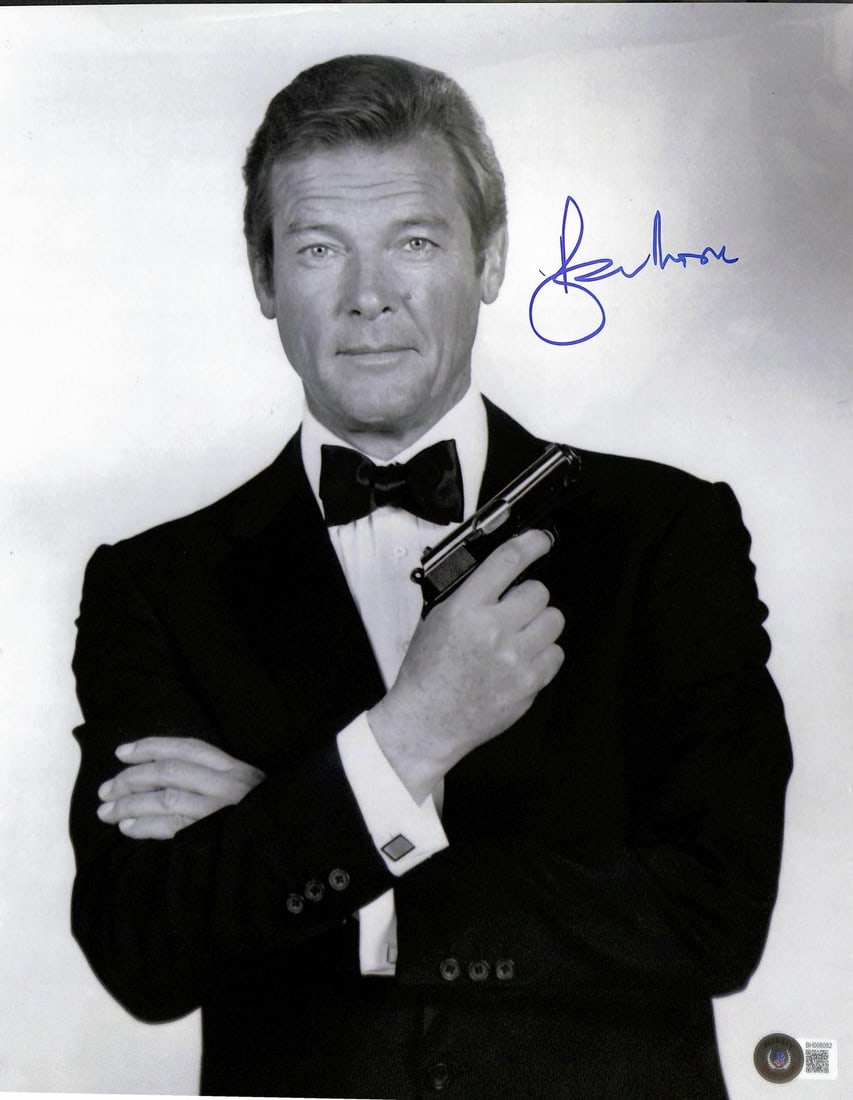 Beckett authenticated Roger Moore signed 11x14 James Bond photo: Beckett authenticated Roger Moore signed 11x14 James Bond photo This 11x14 photograph features a hand-signed autograph from Roger Moore, renowned for his role as James Bond. The signature has been aut