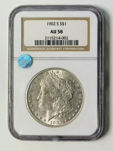 NGC AU 58 1902 S Morgan Silver Dollar Sight White: NGC AU 58 1902 S Morgan Silver Dollar Sight White 1902 S Morgan Silver Dollar certified by NGC and graded AU 58. This pre-owned silver dollar is dated 1902 and identified as a Sight White example. It 