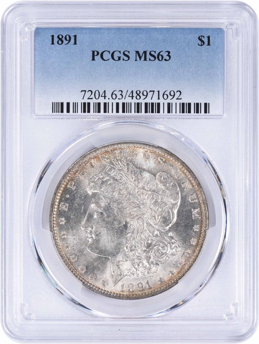 1891 Morgan Silver Dollar MS63 PCGS Uncirculated Coin: 1891 Morgan Silver Dollar MS63 PCGS Uncirculated Coin This 1891 Morgan Silver Dollar is a stunning piece of history, featuring a striking design by George T. Morgan. Certified by PCGS with a grade of 