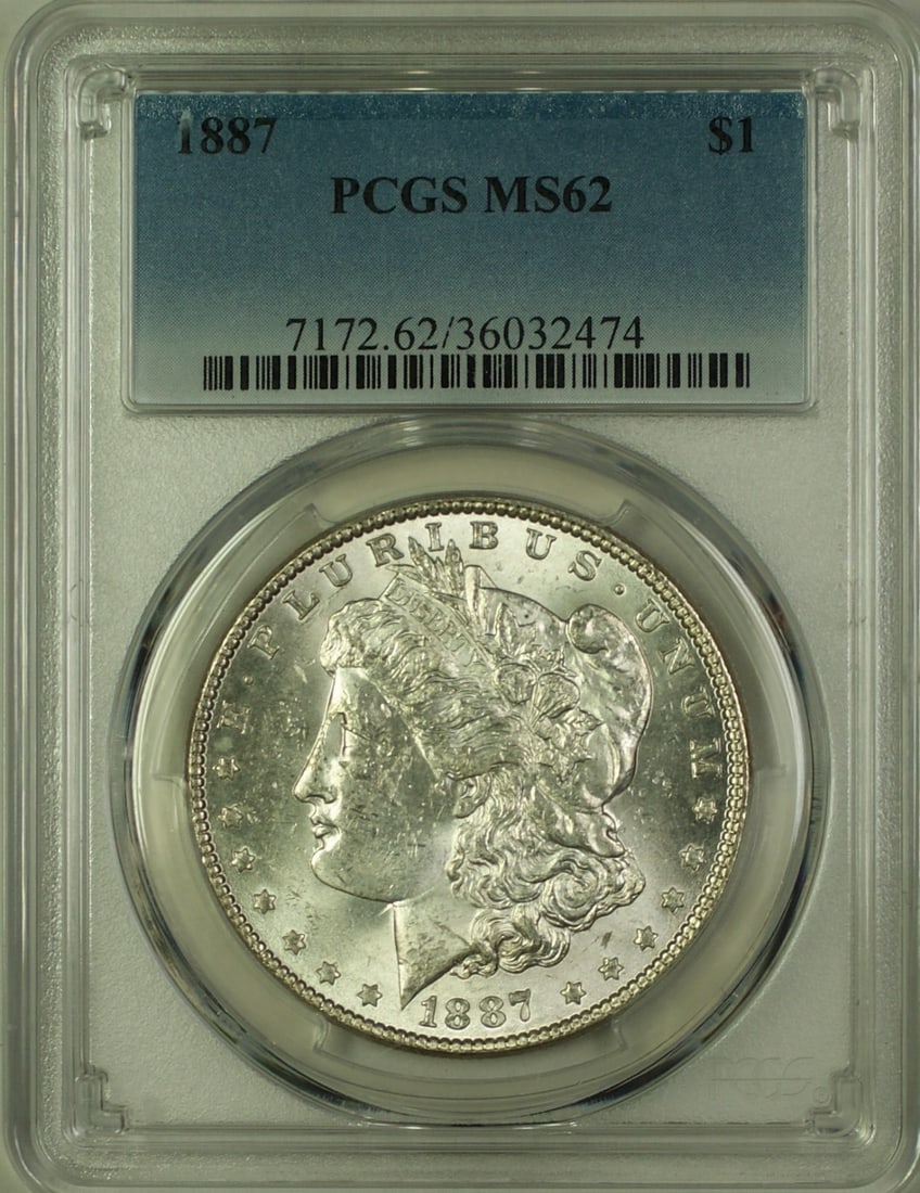 PCGS MS62 1887 Morgan Silver Dollar: PCGS MS62 1887 Morgan Silver Dollar This is an 1887 Morgan Silver Dollar with a denomination of $1, certified by PCGS and graded MS-62. The coin was minted in Philadelphia and is composed of silver. I