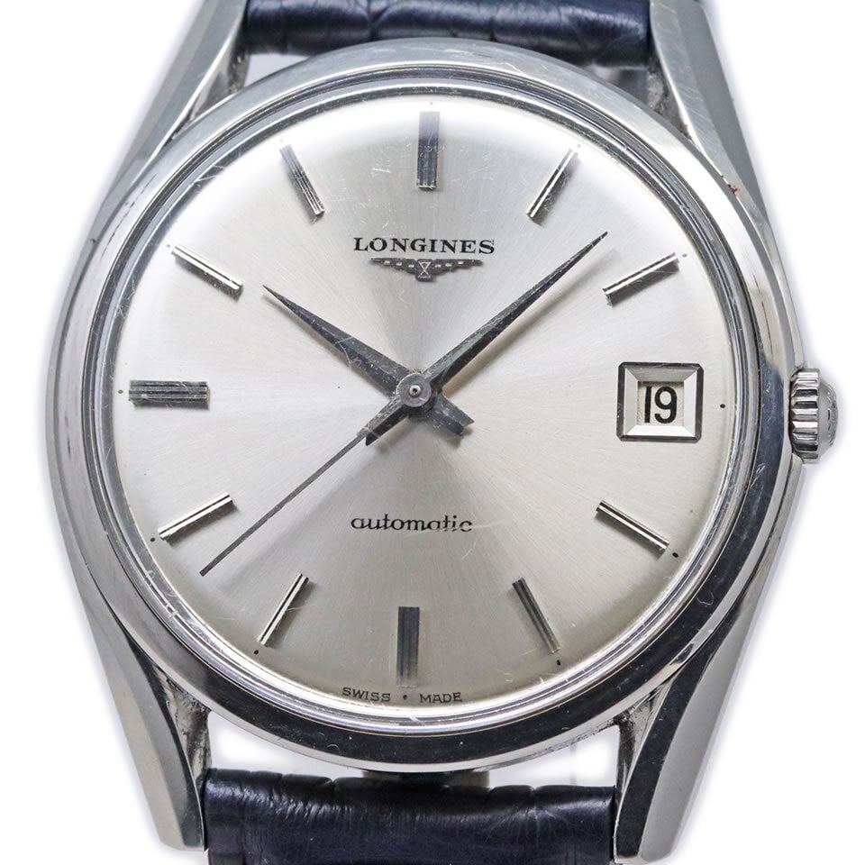 Vintage LONGINES Automatic Date 7171-1 Unisex Watch Caliber 291 1960s: Vintage LONGINES Automatic Date 7171-1 Unisex Watch Caliber 291 1960s Discover the elegance of this vintage LONGINES Automatic Date wristwatch, model 7171-1, produced in the 1960s. This unisex timepie