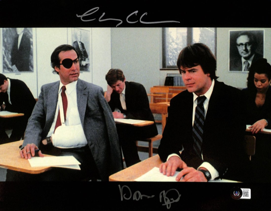 Beckett Certified 11x14 Spies Like Us Photo Signed by Chevy Chase Dan Aykroyd: Beckett Certified 11x14 Spies Like Us Photo Signed by Chevy Chase Dan Aykroyd This 11x14 photograph features a scene from the film "Spies Like Us" and has been hand-signed by Chevy Chase and Dan Aykro