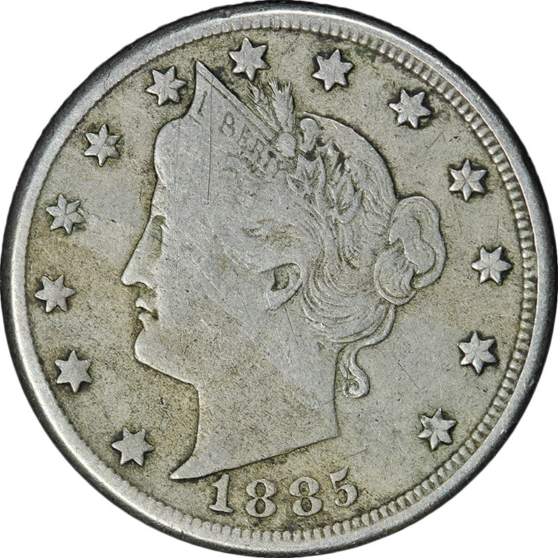 1885 Liberty Head V Nickel Key Date F VF: 1885 Liberty Head V Nickel Key Date F VF An original 1885 Liberty V Nickel in circulated condition with nice eye appeal and a nice strike. It is described as having great color and great surfaces, and
