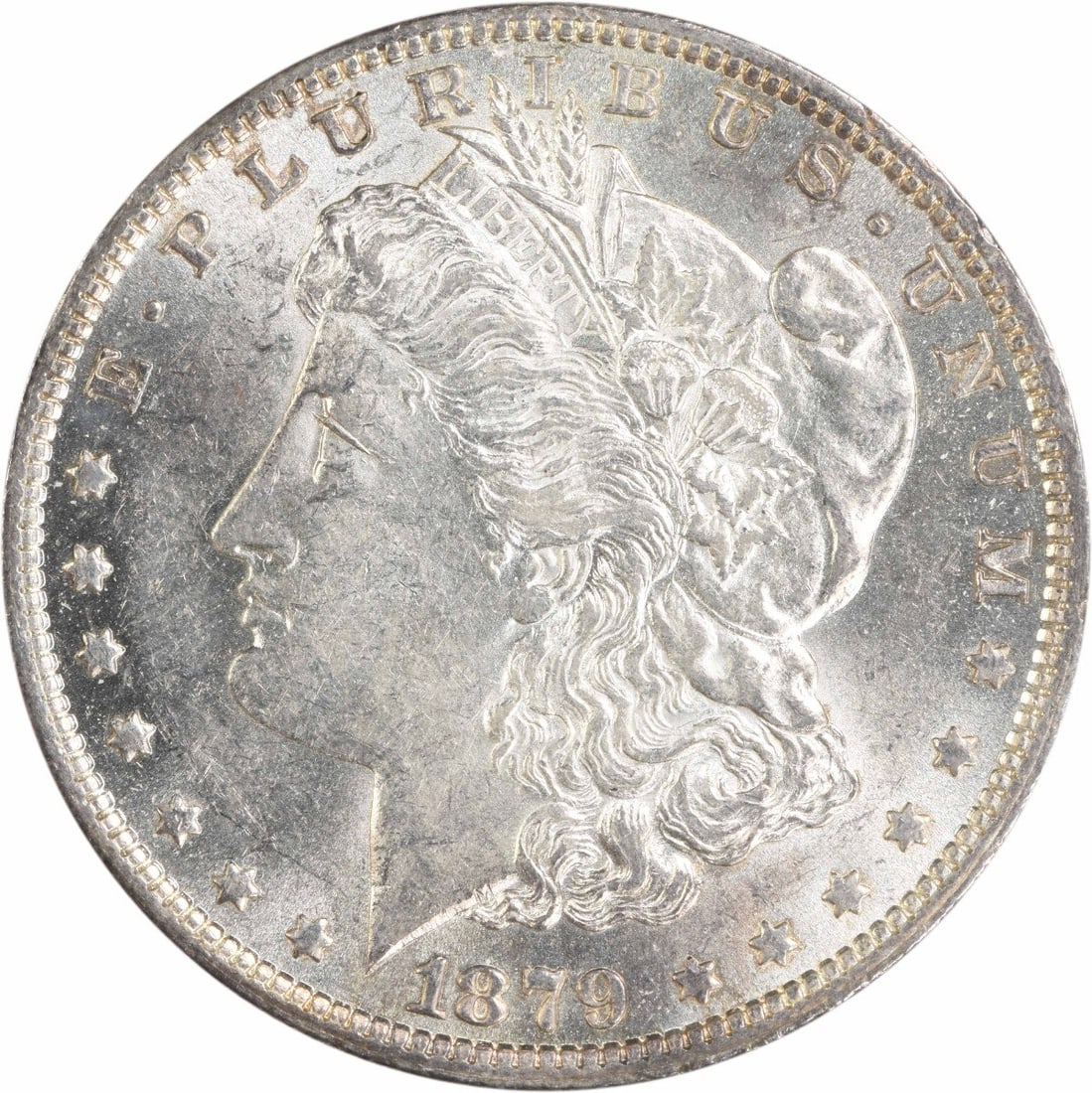 1879 O Morgan Dollar AU Slider Uncertified: 1879 O Morgan Dollar AU Slider Uncertified This 1879-O Morgan Silver Dollar is a pre-owned coin from the New Orleans Mint. It is composed of 90% silver and 10% copper, with a reeded edge and a diamete