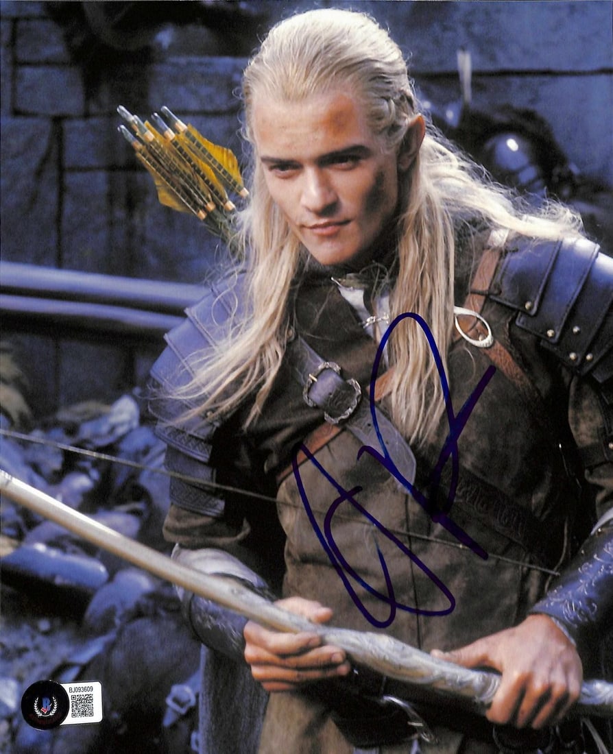 8x10 Orlando Bloom Legolas photo Beckett authenticated signed: 8x10 Orlando Bloom Legolas photo Beckett authenticated signed This is a signed 8x10 photograph of Orlando Bloom as Legolas from The Lord of the Rings film series. The photo features Orlando Bloom in f