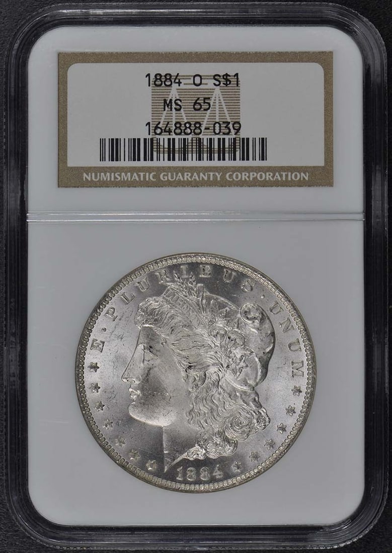 1884-O Morgan Dollar NGC MS65 Uncirculated Coin: 1884-O Morgan Dollar NGC MS65 Uncirculated Coin This 1884-O Morgan Dollar, certified by NGC, boasts a remarkable MS65 grade, indicating its uncirculated condition. Minted in New Orleans, this coin is 