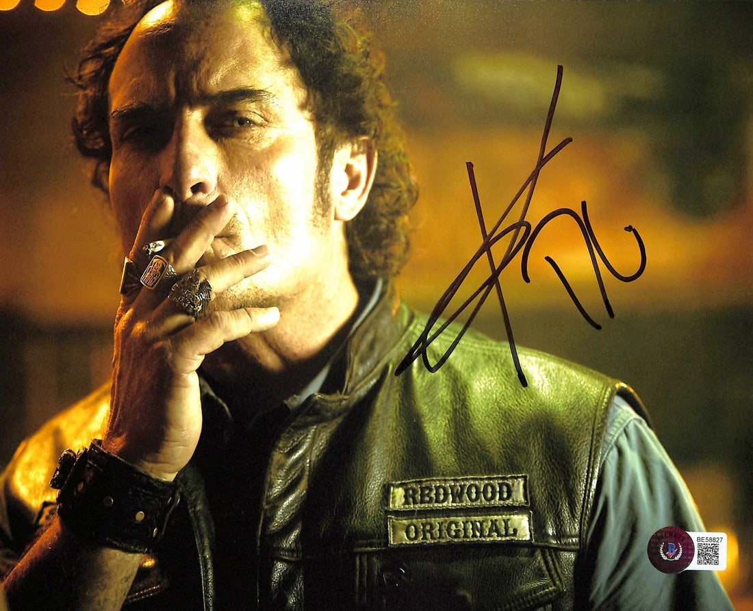 Kim Coates Sons of Anarchy Signed 8x10 Photo Beckett Authenticated: Kim Coates Sons of Anarchy Signed 8x10 Photo Beckett Authenticated This autographed 8x10 photograph features Kim Coates, known for his role as "Tig Trager" in the acclaimed TV series Sons of Anarchy. 