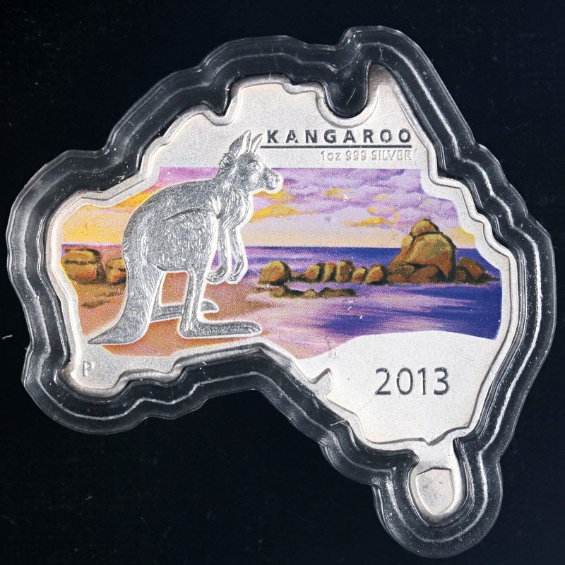 2013 Australia 1 Ounce Silver Proof Kangaroo Map Coin OGP COA: 2013 Australia 1 Ounce Silver Proof Kangaroo Map Coin OGP COA This stunning 2013 Australia 1 Ounce Silver $1 coin features a unique map-shaped design of the iconic Kangaroo. Struck in high-quality sil