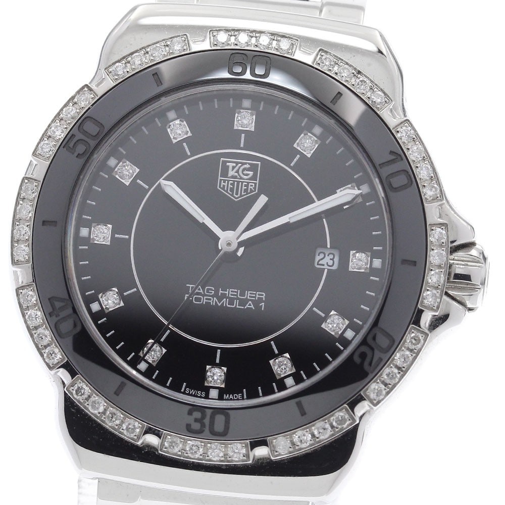 TAG Heuer Formula 1 Diamond Bezel Quartz Ladies Watch WAH1312: TAG Heuer Formula 1 Diamond Bezel Quartz Ladies Watch WAH1312 This TAG HEUER Formula 1 WAH1312 women's wristwatch features a Swiss-made quartz movement and a diamond bezel with 12 diamonds. Designed s