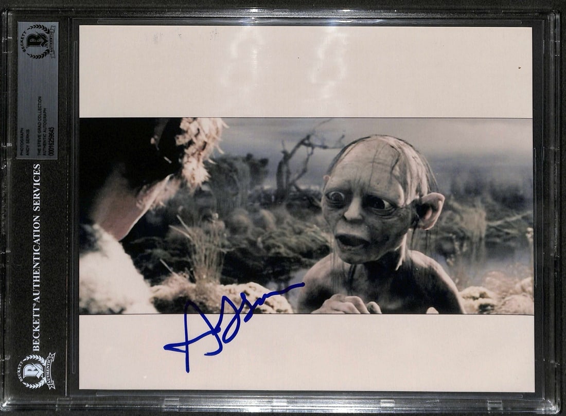Andy Serkis Signed 8x10 Gollum Photo BECKETT Authenticated: Andy Serkis Signed 8x10 Gollum Photo BECKETT Authenticated This outstanding 8x10 color photo features Gollum from The Lord of the Rings: The Return of the King, beautifully signed in blue permanent ma