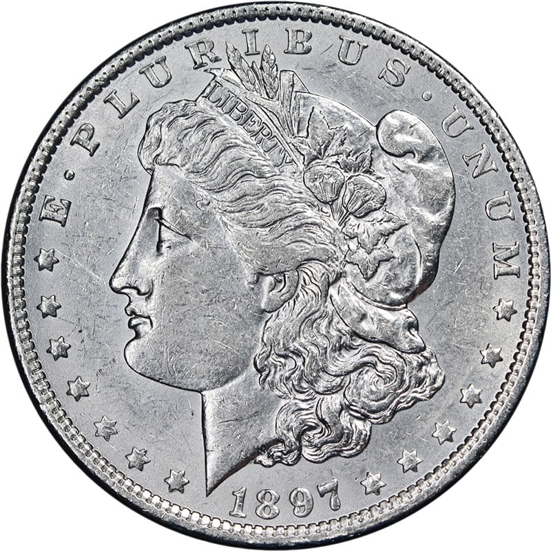 1897 O Morgan Dollar Silver AU BU Bright White: 1897 O Morgan Dollar Silver AU BU Bright White This 1897-O Morgan Silver Dollar features attractive eye appeal, bright white luster, and an average strike. The coin displays nice color and surfaces, a