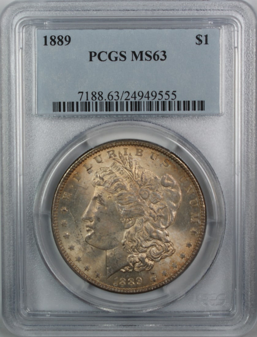 PCGS MS63 1889 Morgan Dollar Toned Philadelphia: PCGS MS63 1889 Morgan Dollar Toned Philadelphia This 1889 Morgan Silver Dollar is certified by PCGS with a grade of MS-63, indicating a well-preserved, uncirculated coin. It features attractive toning