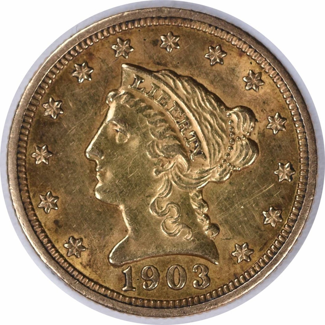 1903 Liberty Head $2.50 Gold Coin AU Grade Uncertified Philadelphia Mint: 1903 Liberty Head $2.50 Gold Coin AU Grade Uncertified Philadelphia Mint This 1903 $2.50 Gold Liberty Head coin, designed by Christian Gobrecht, was minted in Philadelphia. It is an uncertified, circu