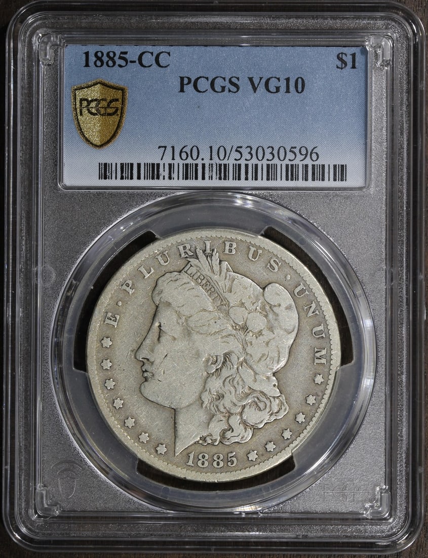 PCGS VG10 1885 CC Morgan Silver Dollar Carson City Mint: PCGS VG10 1885 CC Morgan Silver Dollar Carson City Mint This 1885 Morgan Silver Dollar was minted in Carson City and is graded VG10 by the Professional Coin Grading Service (PCGS). The coin is compose
