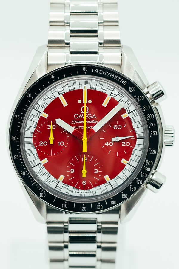 Omega Speedmaster Red 3510.61 Stainless Steel Watch with Red Arabic Dial: Omega Speedmaster Red 3510.61 Stainless Steel Watch with Red Arabic Dial This Omega Speedmaster Red features a striking red Arabic numeral dial, complemented by a fixed bezel and a stainless steel bra