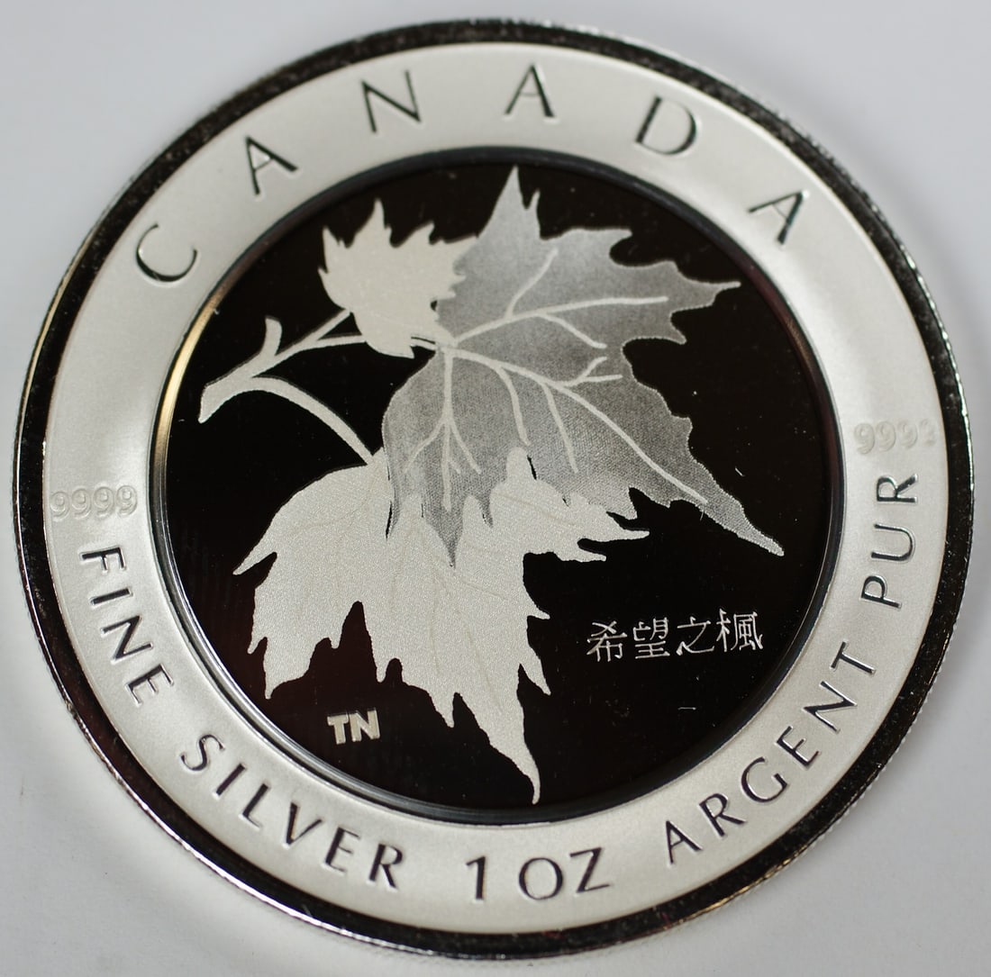 2005 $5 Silver Maple Leaf of Hope Coin with Box and COA Canada: 2005 $5 Silver Maple Leaf of Hope Coin with Box and COA Canada This 2005 Canada $5 Silver Maple Leaf of Hope coin features a Chinese-themed design. Minted with a fineness of 0.9999 silver, it comes un