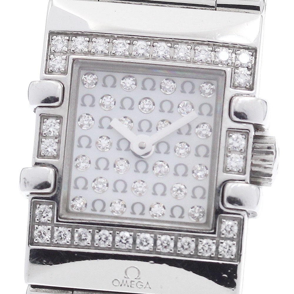 Omega Constellation Quadra Mini 1539.77 Quartz Ladies Watch: Omega Constellation Quadra Mini 1539.77 Quartz Ladies Watch This OMEGA Constellation Quadra Mini Quartz ladies wristwatch features a stainless steel case and bracelet, complemented by a white mother-o