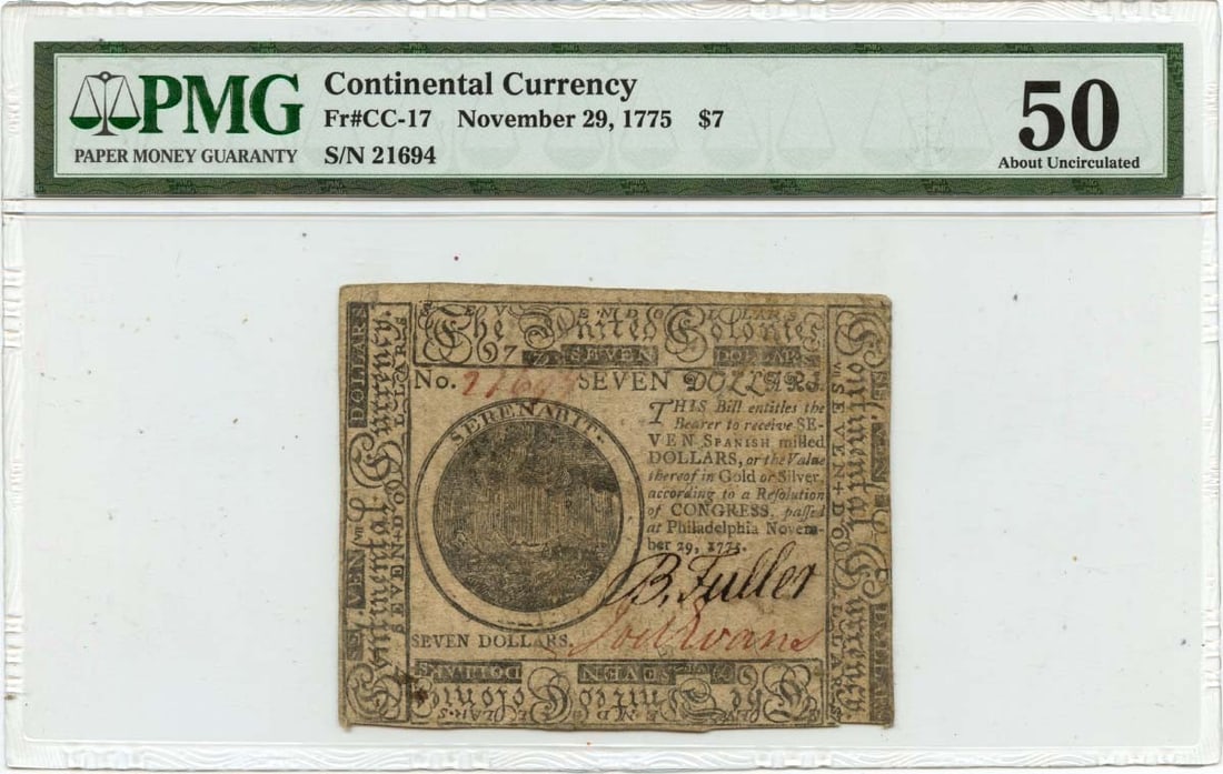 1775 $7 Continental Currency Note PMG AU50 Certified: 1775 $7 Continental Currency Note PMG AU50 Certified This is a $7 Continental Currency note dated November 29, 1775. It has been certified by PMG with a grade of AU50, indicating it is in circulated c