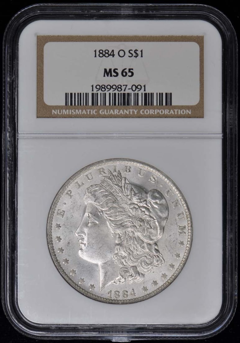 1884-O Morgan Dollar NGC MS65 Uncirculated Coin: 1884-O Morgan Dollar NGC MS65 Uncirculated Coin This stunning 1884-O Morgan Dollar, certified by NGC with a grade of MS65, showcases exceptional quality and detail. Struck at the New Orleans mint, thi