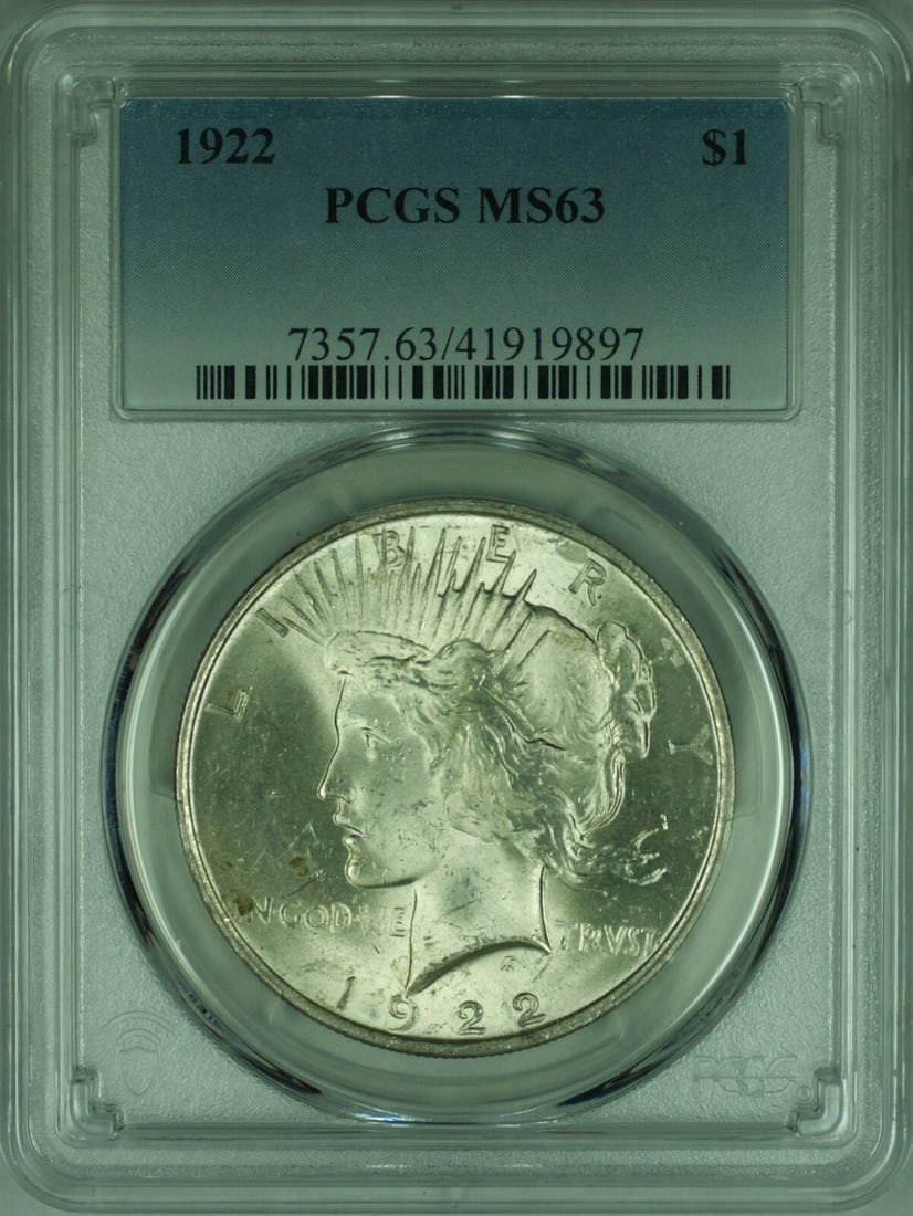 PCGS MS63 1922 Peace Silver Dollar: PCGS MS63 1922 Peace Silver Dollar This 1922 Peace Silver Dollar is certified by PCGS with a grade of MS-63. Struck in Philadelphia, the coin is composed of silver and remains uncirculated. It feature