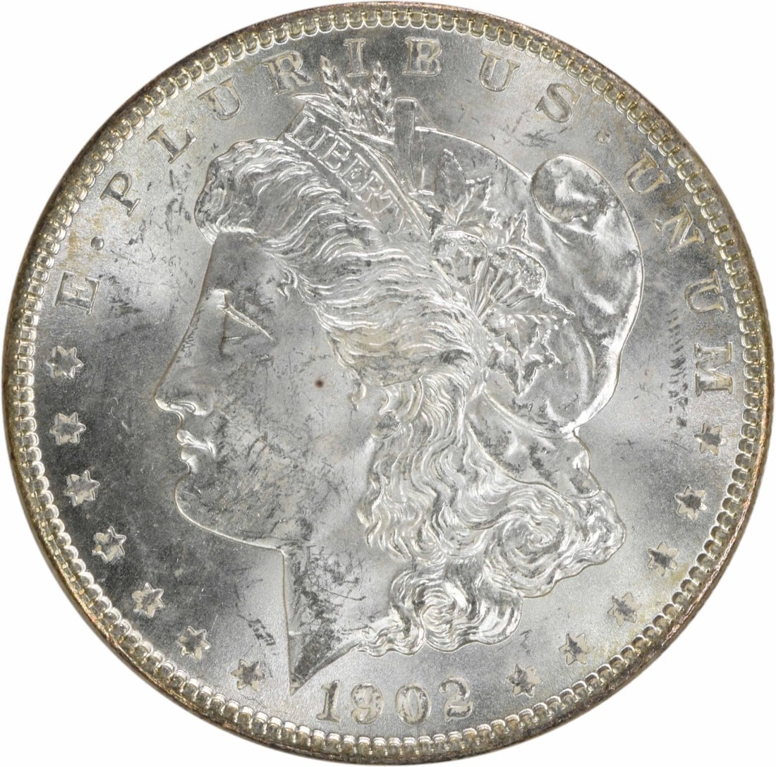 Choice BU 1902-O Silver Morgan Dollar Uncertified US Coin: Choice BU 1902-O Silver Morgan Dollar Uncertified US Coin This is a 1902-O Morgan Silver Dollar from the United States, featuring the New Orleans Mint mark. The coin is composed of silver and is in Ch