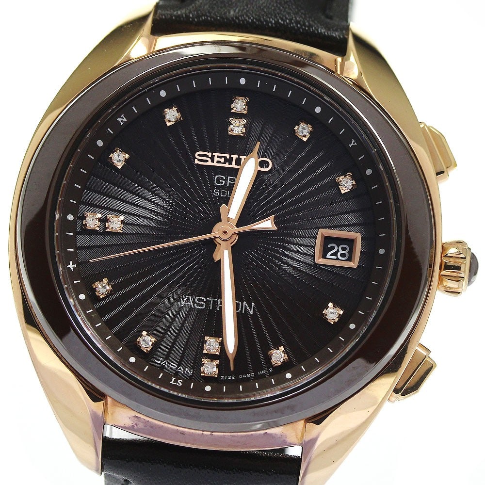Seiko Astron STXD004 Solar Radio Controlled Date Watch: Seiko Astron STXD004 Solar Radio Controlled Date Watch This Seiko Astron STXD004 women's wristwatch features a stainless steel, ceramic, and gold-plated case paired with an unused leather band and buc