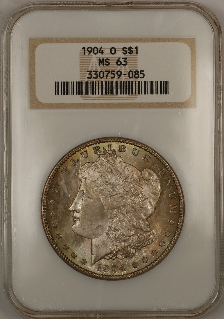 NGC MS-63 1904-O Morgan Dollar Silver Coin with Toning: NGC MS-63 1904-O Morgan Dollar Silver Coin with Toning This is a 1904-O Morgan Silver Dollar $1 coin, certified by NGC with a grade of MS 63. The coin originates from the United States and was minted 
