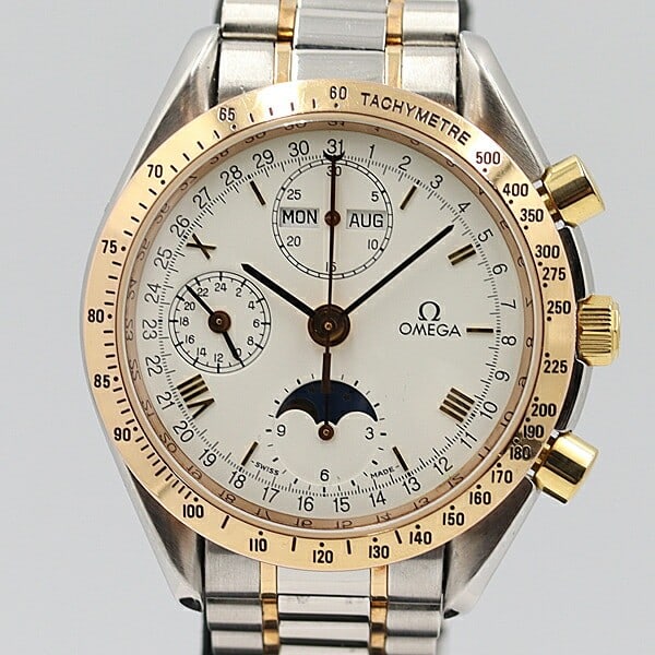 OMEGA Speedmaster men's automatic wristwatch yellow gold steel: OMEGA Speedmaster men's automatic wristwatch yellow gold steel This OMEGA Speedmaster 3336.20 is a men's automatic wristwatch crafted with a combination of yellow gold and stainless steel. Made in Swi