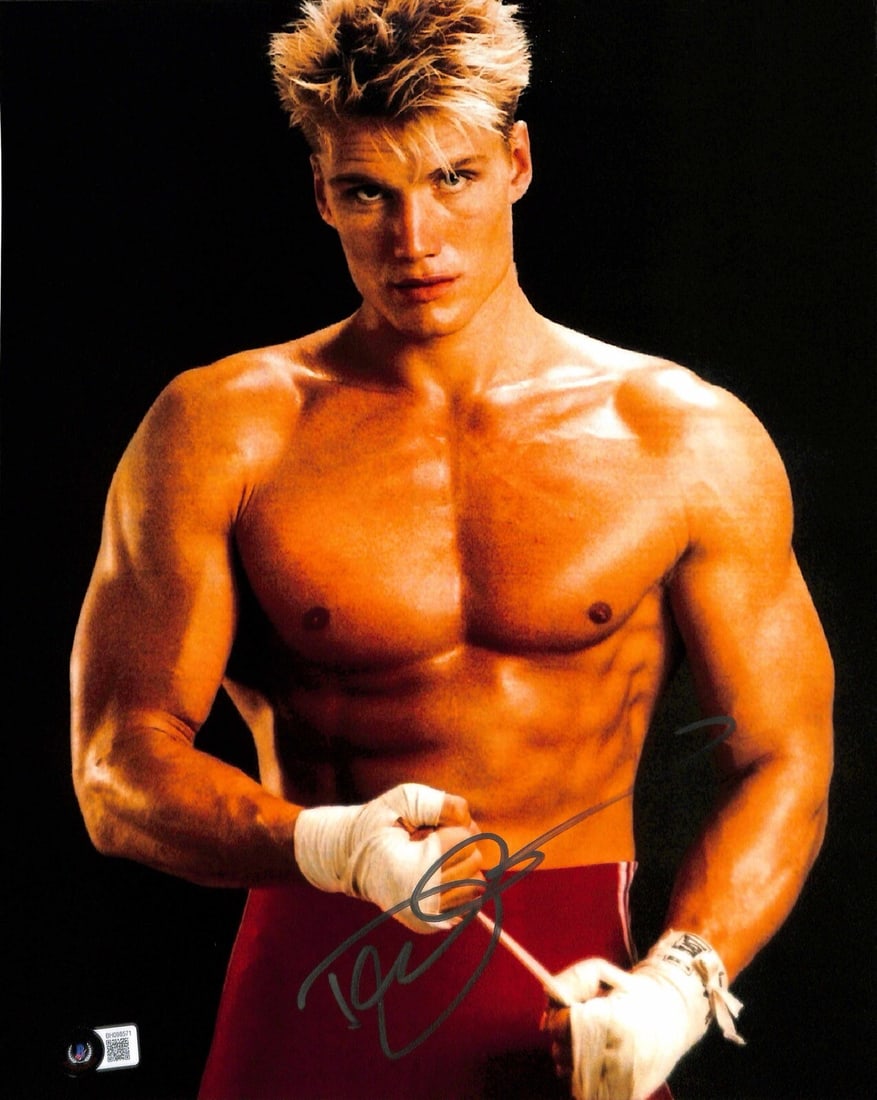 Dolph Lundgren Autographed 11x14 Ivan Drago Rocky Photo Beckett Certified: Dolph Lundgren Autographed 11x14 Ivan Drago Rocky Photo Beckett Certified This is an original 11x14 photograph autographed by Dolph Lundgren, who portrayed Ivan Drago in the movie Rocky IV. The signat