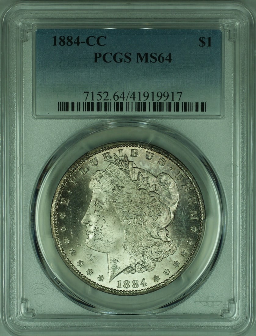 PCGS MS-64 Carson City 1884 Morgan Silver Dollar $1 Coin: PCGS MS-64 Carson City 1884 Morgan Silver Dollar $1 Coin This is an 1884-CC Morgan Silver Dollar from the Carson City Mint, certified by PCGS with a grade of MS-64. The coin is composed of silver, unc