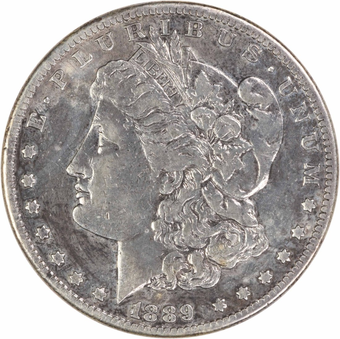 1889 CC Morgan Dollar Carson City VF Uncertified: 1889 CC Morgan Dollar Carson City VF Uncertified This 1889-CC Morgan Silver Dollar is a circulated coin graded as Very Fine (VF). Minted in Carson City, it is composed of 90% silver and 10% copper, de