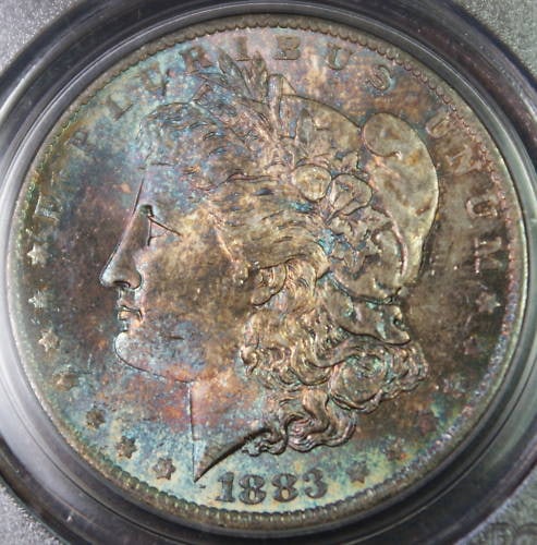 PCGS MS64 1883-O Morgan Silver Dollar Toned: PCGS MS64 1883-O Morgan Silver Dollar Toned This is an 1883-O Morgan Silver Dollar coin graded MS-64 by PCGS. Struck at the New Orleans Mint, this uncirculated coin features attractive toning and is c