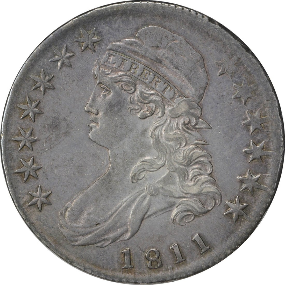 1811 Bust Half Dollar AU John Reich Philadelphia Mint 50C: 1811 Bust Half Dollar AU John Reich Philadelphia Mint 50C This 1811 Bust Half Dollar is an exquisite piece of American numismatic history. Struck in Philadelphia, this coin features a composition of 8