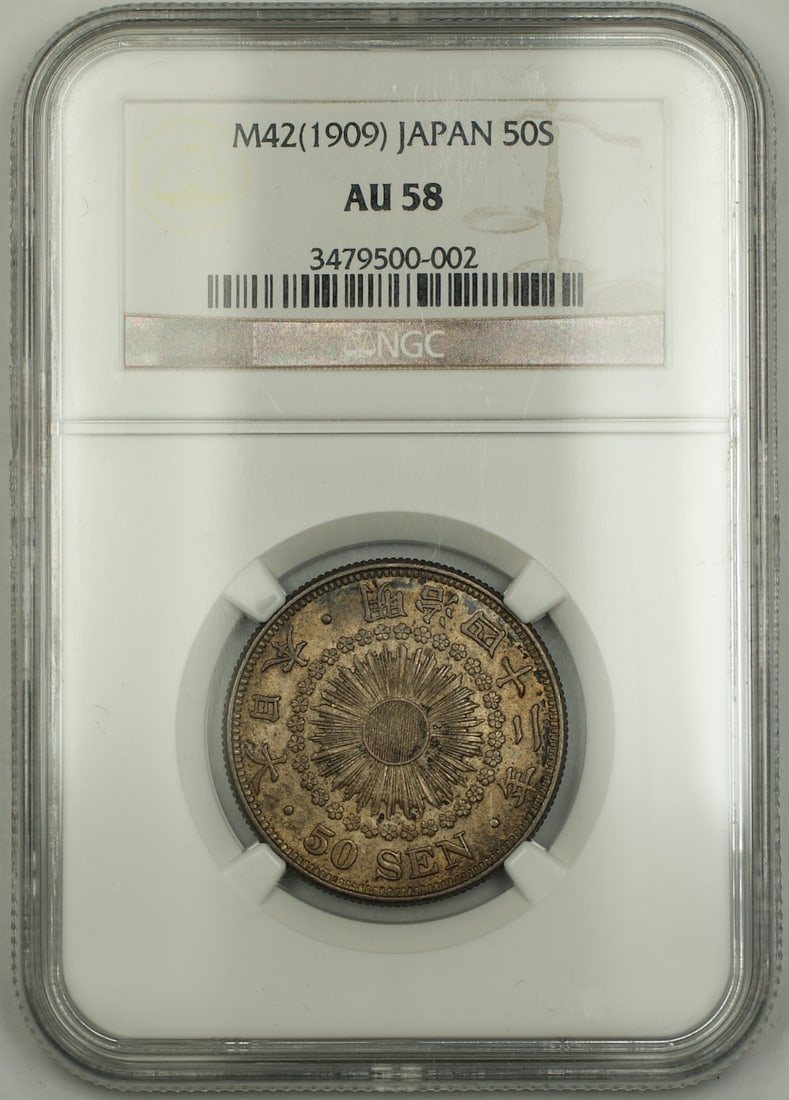 1909 Japan 50 Sen Silver NGC AU 58 Certified Coin: 1909 Japan 50 Sen Silver NGC AU 58 Certified Coin This is a 1909 Japan 50 Sen silver coin, certified and graded AU-58 by NGC. The coin is composed of silver and originates from Japan. It is in pre-own