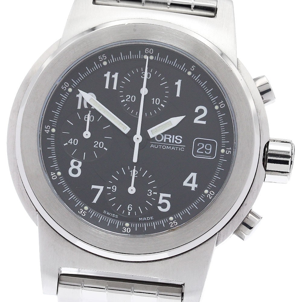 ORIS Big Crown Date Chronograph Stainless Steel Men's Wristwatch 7511: ORIS Big Crown Date Chronograph Stainless Steel Men's Wristwatch 7511 This pre-owned ORIS Big Crown Date Chronograph men's wristwatch features a stainless steel case and bracelet, complemented by a bl