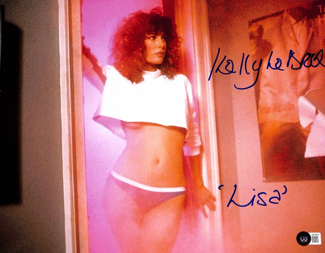 Kelly Lebrock Signed 11x14 Weird Science Photo Beckett Certified: Kelly Lebrock Signed 11x14 Weird Science Photo Beckett Certified This is an autographed 11x14 photograph of actress Kelly Lebrock, known for her role as "Lisa" in the classic film Weird Science. The p