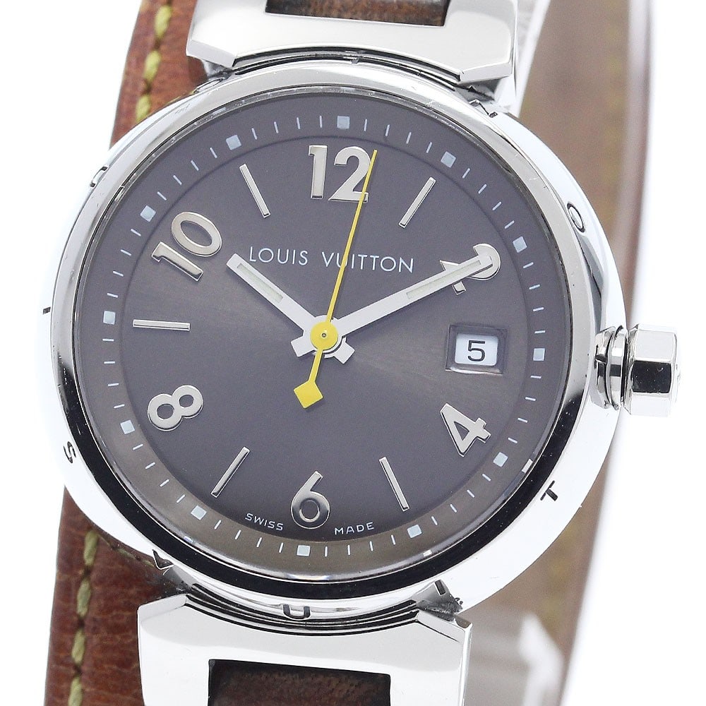 Louis Vuitton Tambour Quartz Date Ladies Wristwatch Q1211: Louis Vuitton Tambour Quartz Date Ladies Wristwatch Q1211 This Louis Vuitton Tambour Date Quartz women's wristwatch features a stainless steel case and a brown dial, complemented by a leather strap. T