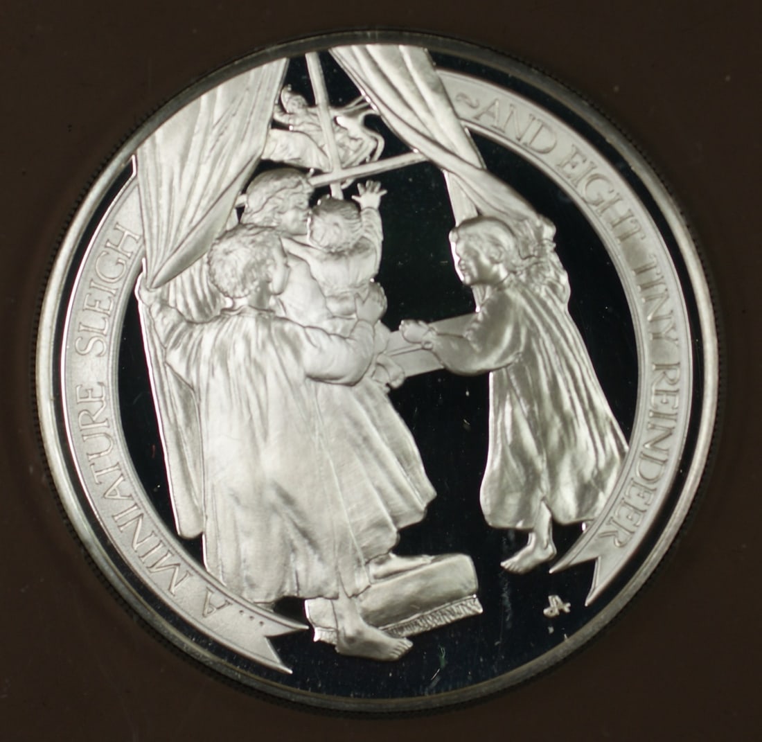 Sterling Silver 1982 Holiday Proof Medal Keeping an Eye On Santa: Sterling Silver 1982 Holiday Proof Medal Keeping an Eye On Santa This is a 1982 Franklin Mint holiday medal titled "Keeping an Eye On Santa," crafted in sterling silver with a proof finish. The piece 