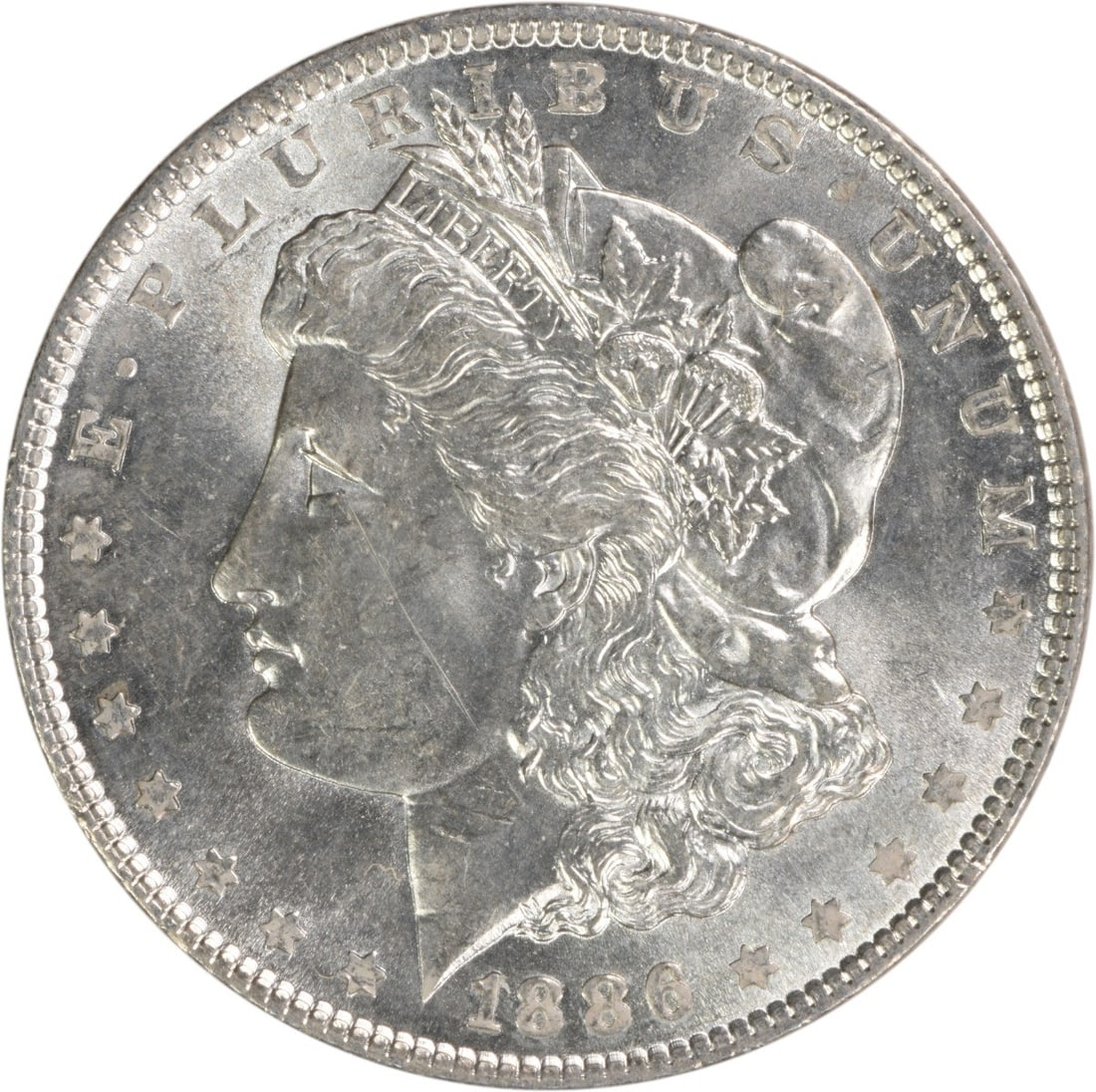Choice BU 1886 Silver Dollar Morgan Uncirculated Uncertified Coin: Choice BU 1886 Silver Dollar Morgan Uncirculated Uncertified Coin This 1886 Morgan Silver Dollar is a Choice Brilliant Uncirculated example. Composed of silver and struck in the United States with no 