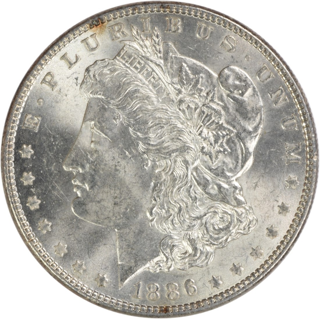 Choice BU 1886 Silver Dollar Morgan Uncertified Philadelphia Mint: Choice BU 1886 Silver Dollar Morgan Uncertified Philadelphia Mint This is an 1886 Morgan Silver Dollar featuring a Choice Brilliant Uncirculated (BU) grade. The coin is composed of silver and was mint